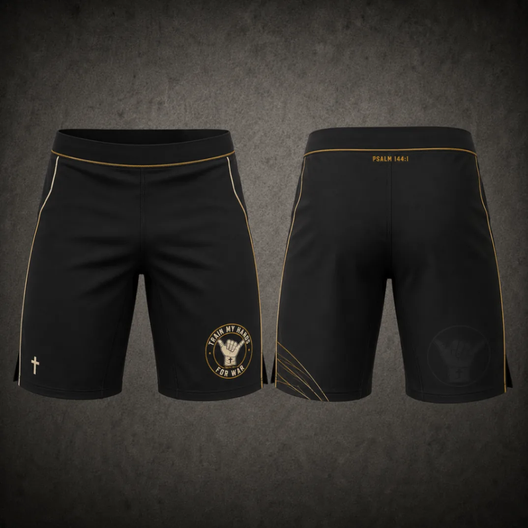 Front and back of black TMHFW grappling shorts with antique-gold piping and chest crest