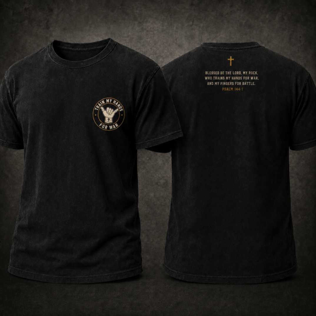 Product mockup: front and back of the black TMHFW Foundation Tee in heavyweight cotton — ivory-and-gold shaka crest screen printed left of center on the chest, small brass wordmark at the back neckline